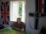 Kaiserschlacht 21 - Player Bryan Gagen considers his next manouvers during a Balloon busting mission, flanked by the Union Jack and the Imperial...