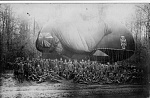 German Balloon Squadron with their caquot balloon.  I am wondering if the balloon is upside down for the picture to hide the camo fabric?