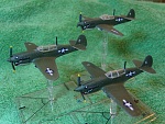 Bandai pre-painted P40N (Warhawk) (1). I replaced the aerial with brass rod, and inserted a brass rod into the bottom so it can sit in the flight...