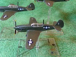 Bandai pre-painted P40N (Warhawk) (2). I replaced the aerial with brass rod, and inserted a brass rod into the bottom so it can sit in the flight...