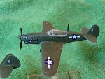 Bandai pre-painted P40N (Warhawk) (4). I replaced the aerial with brass rod, and inserted a brass rod into the bottom so it can sit in the flight...