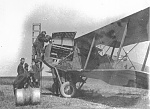 Ground personnel refuel a 96th Aero Squadron Breguet 14B-2 bomber with buckets of gas before a mission, France, 1918. (8AF Museum)