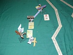 Turn 7b: Another Immelmann by the Triplane allows it to fire on the Rumpler. The Tripe's guns jam.