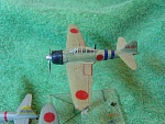 Takara pre-painted A6M2 (Zero) (1). I replaced the aerial with brass rod and inserted a brass rod into the bottom so it can sit in the flight pegs,...