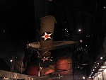 The JN-4 "Jenny" hangs from the roof of the museum.