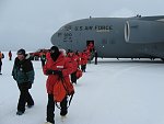 Deplaning from C 17 onto ice shelf