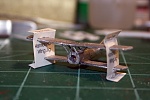 Step 4  was to add the pilot, but I skipped it also and waited until after painting the aircraft.  If you do, you'll need to trim the pilot to...