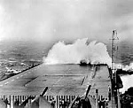 Heavy seas break over flight deck of U.S.S. Yorktown in Typhoon Cobra