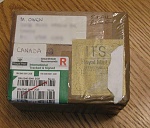 A Package? 
I didn't order anything.  Honest, SWMBO, I didn't! 
 
From Tim [Flying Helmut]?