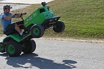 Youngest son and his racing mower.  It does about 50mph and wheelstands. 
All with an 18hp motor and some selective pully management!