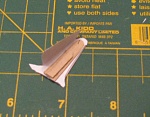 Cardboard re-inforcing glued into wing