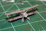 Step 7  Assembled the landing gear struts, axle using the same thickness wire, and glued to the bottom. 
 
Step 8  Glued the engine to the...