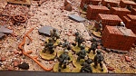 My German Heer reinforced infantry squad seizes control of a Russian factory in one of the Stalingrad games at the convention this year.