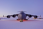 C-17 on the ice in the early season. Stays on the ice long enough to unload and load then turns back for Christchurch, NZ