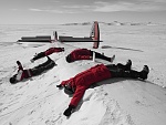 Old Lockheed Constellation  being consumed by sea ice - no injuries in this landing.