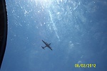 FIFI (B-29) from top turret as she flies over before we took off.