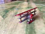 The reason for repainting the Series 1 Red Triplane is that I wanted to create the most successful DR.1 for The Red Baron as opposed to the iconic "Death" DR.1. (in which MVR had but 2 victories).
477/17 was not a difficult repaint and is very similar to the DR1 found in the ARES Dual Pack.
I put the slides on the DR1 repaint thread which I should not have done as the repaint thread is not the place for "how to" - Sorry!
Since the Series 1 DR1 had no pilot I had to add The Baron.  My Bandai warriors come in handy again!